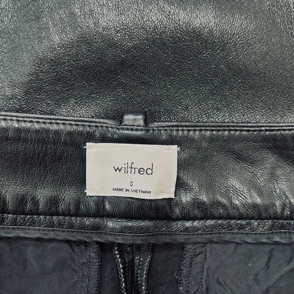 Wilfred preppy black soft faux leather high rise pleated straight leg crop pants